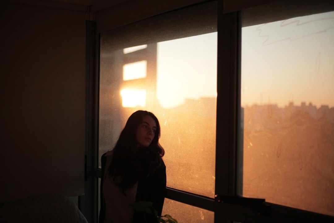person journaling in morning light